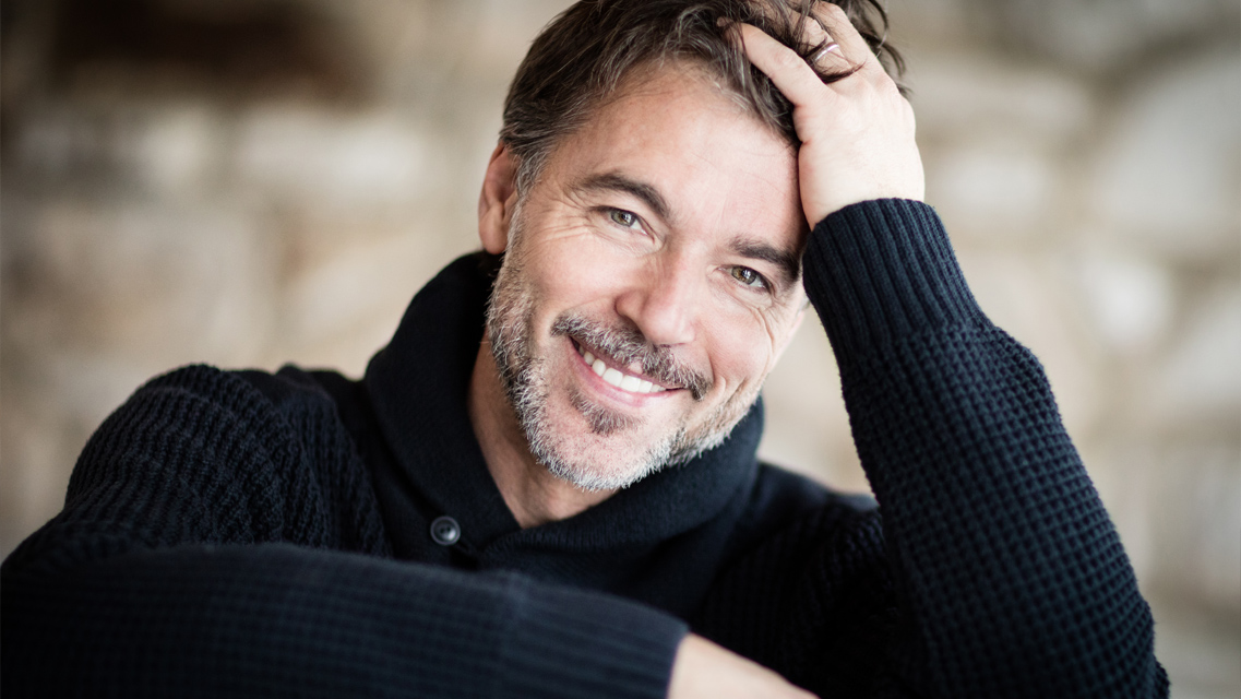 Are Permanent Dentures the Same as Implants?